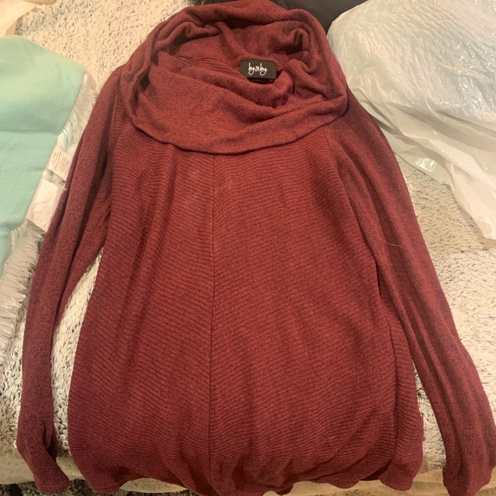 Maroon sweater, barley worn.